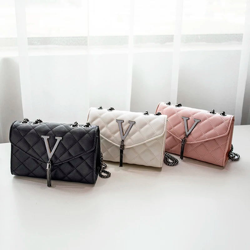 Shop Black Quilted PU Leather Crossbody Bag with Tassel