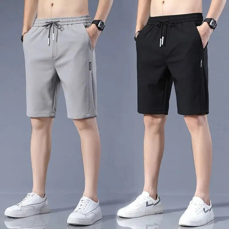 High Quality Polyester Ice Silk Shorts Men New Korean Version Of Loose Elastic Splicing Beach Five Minute Medium Pants