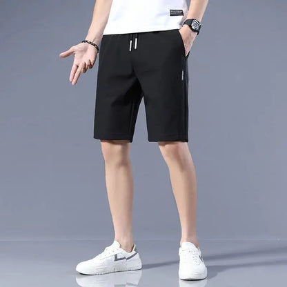 High Quality Polyester Ice Silk Shorts Men New Korean Version Of Loose Elastic Splicing Beach Five Minute Medium Pants