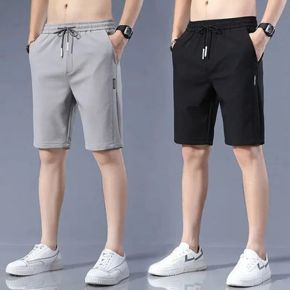 High Quality Polyester Ice Silk Shorts Men New Korean Version Of Loose Elastic Splicing Beach Five Minute Medium Pants