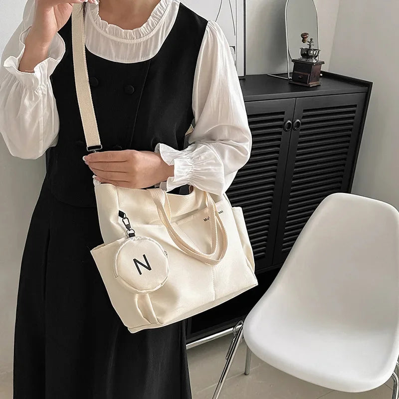 Shop Women's Canvas Crossbody Tote - Stylish Messenger Handbag for Students