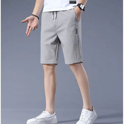 High Quality Polyester Ice Silk Shorts Men New Korean Version Of Loose Elastic Splicing Beach Five Minute Medium Pants